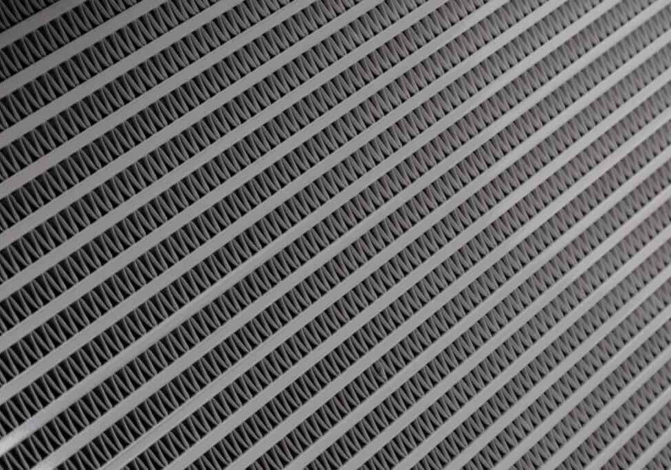 Auto radiator background. Engine cooler background. Vintage style.Grid radiator air conditioning, close-up